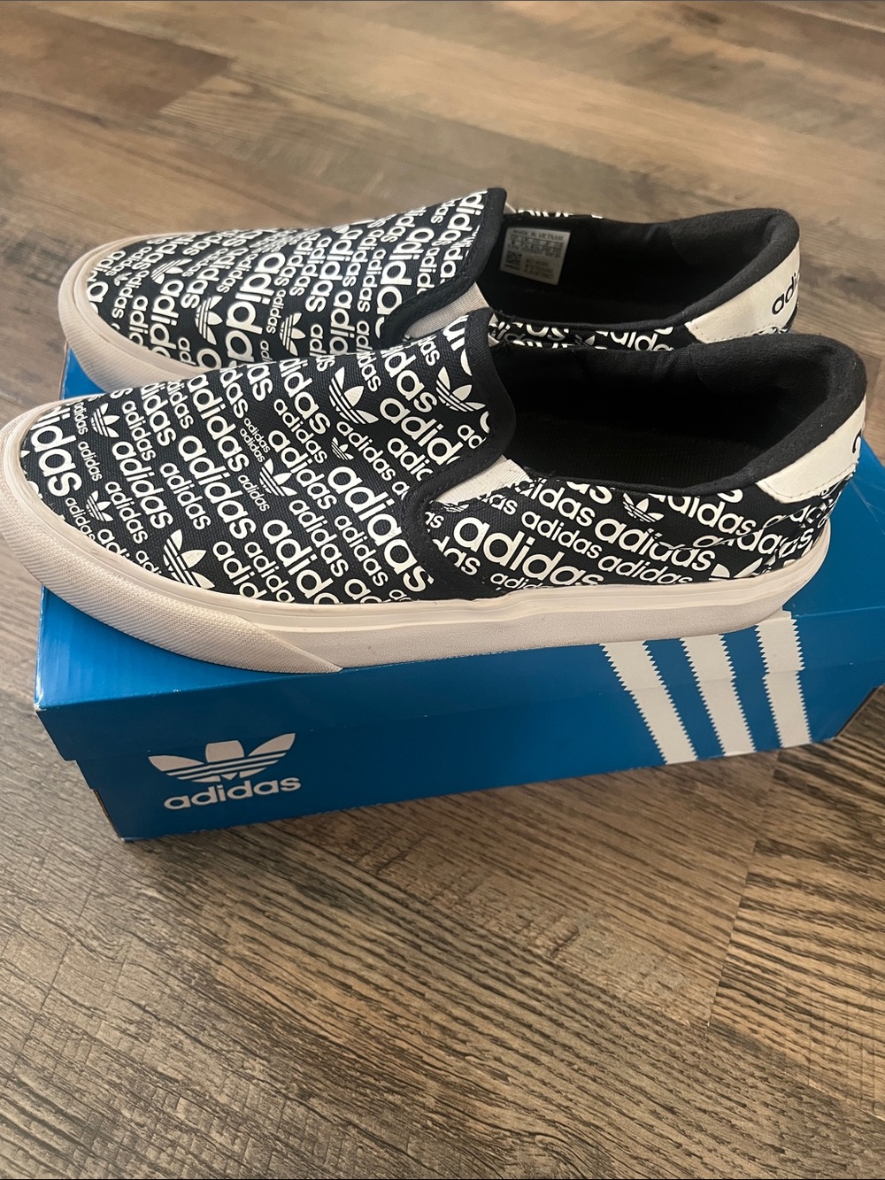 adidas Black and White Slip-On Logo Sneakers